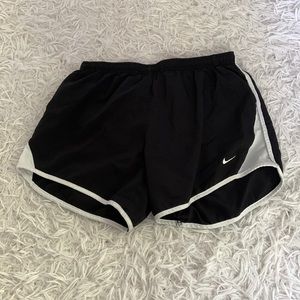 Black and white Nike running shorts
